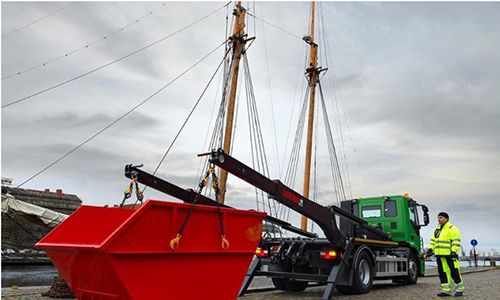 Tìm Hiểu Về Xe Xuồng Chở Rác Thái- Skip Loader